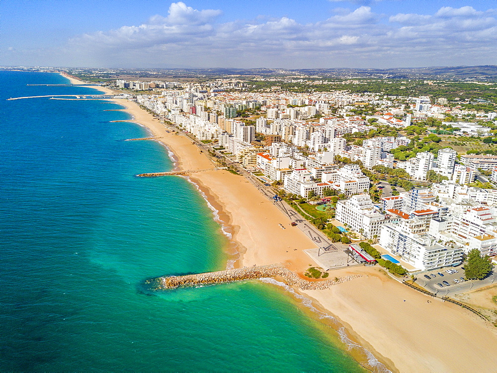 Aerial view, wide sandy beach in touristic resorts of Quarteira and Vilamoura, Algarve, Portugal, Europe