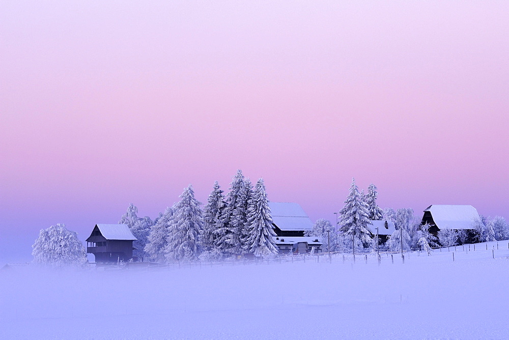 Winter mood at dawn with an old Spycher, or barn, in the foreground, Lindenberg, Aargau, Switzerland, Europe