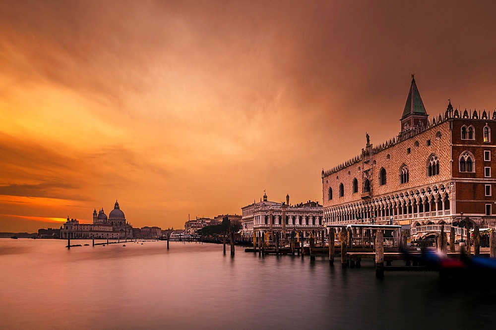 Doge's Palace, St Mark's Square, behind Santa Maria della Salute at sunset, Venice, Veneto, Italy, Europe