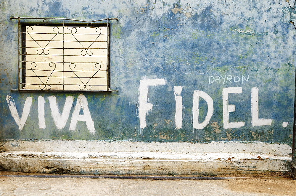 ""Viva Fidel"" lettering on a wall, historic centre, La Habana Vieja, Havana, Ciudad de La Habana, Cuba, Central America