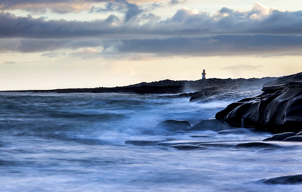 Lighthouse by the coast, high tide, Inis Oirr, Aran Islands, Ireland, Europe