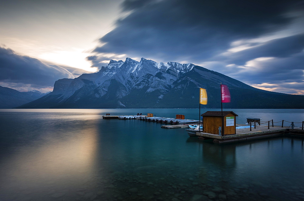 Boathouse on Lake Minnewanka, Sunrise, Mountains with Snow, Banff, Banff National Park, Rocky Mountains, Alberta, Canada, North America