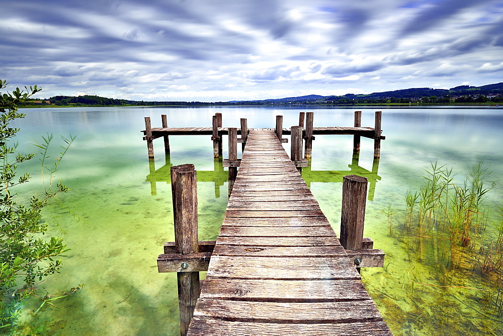 Wooden pier at Pfäffikersee, cloudy sky, Pfäffikon, Canton of Zurich, Switzerland, Europe