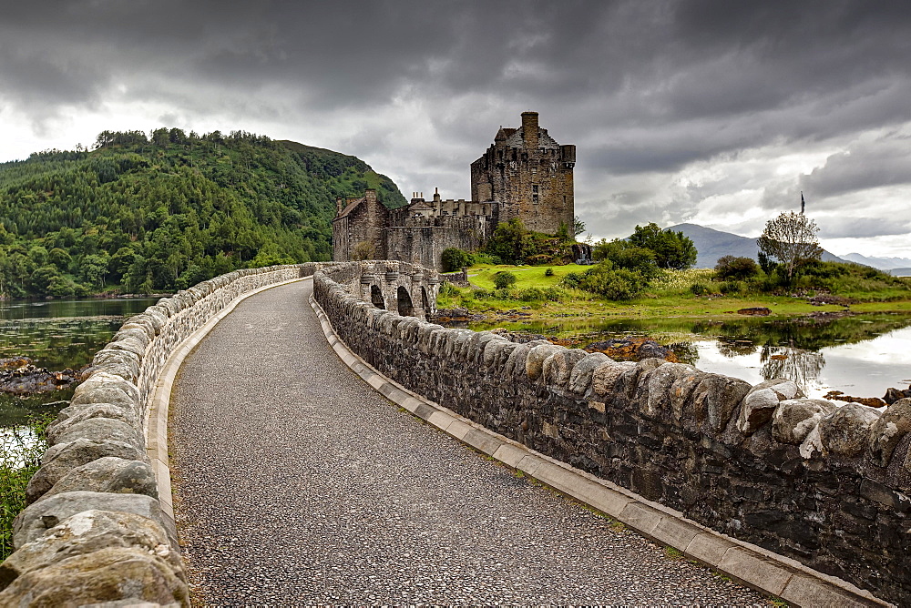 Eilean Donan Castle at the confluence of Loch Duich, Loch Alsh and Loch Long, Scottish Highlands, Dornie, Scotland, United Kingdom, Europe