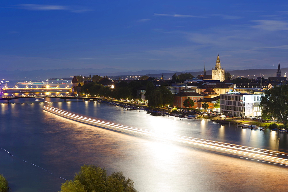 Light tracers of ships on the Rhine River during the Seenachtfest Festival, Constance Minster at the rear, Konstanz, Baden-Wurttemberg, Germany, Europe