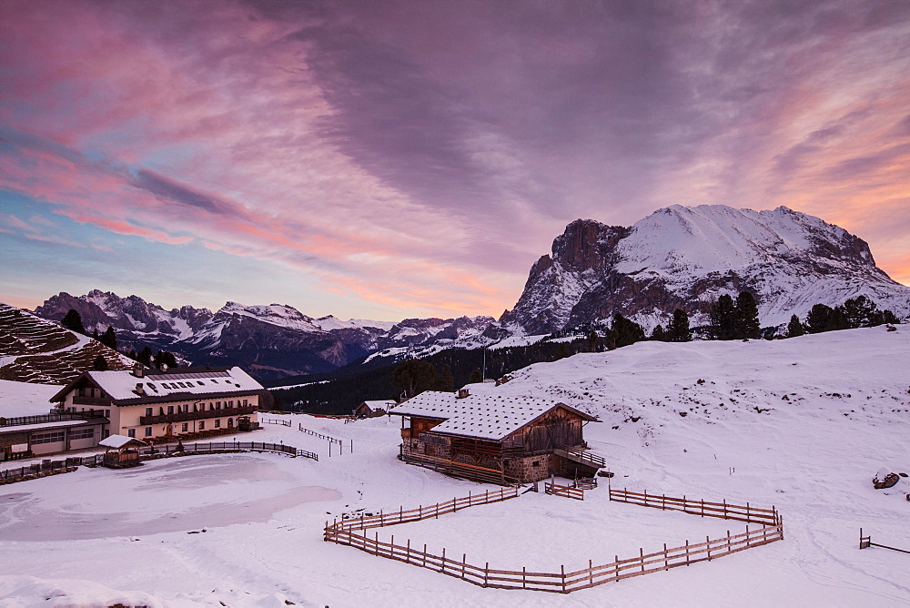 Dawn on Plattkofel and Mahlknechthutte hut in winter, Saltria, Province of South Tyrol, Italy, Europe