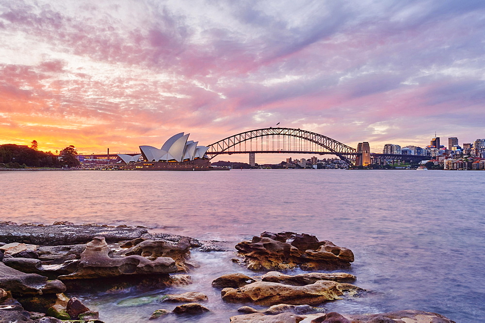 Sydney Opera House with the Sydney Harbor Bridge and skyscrapers, dusk, Sydney, New South Wales, Australia, Oceania