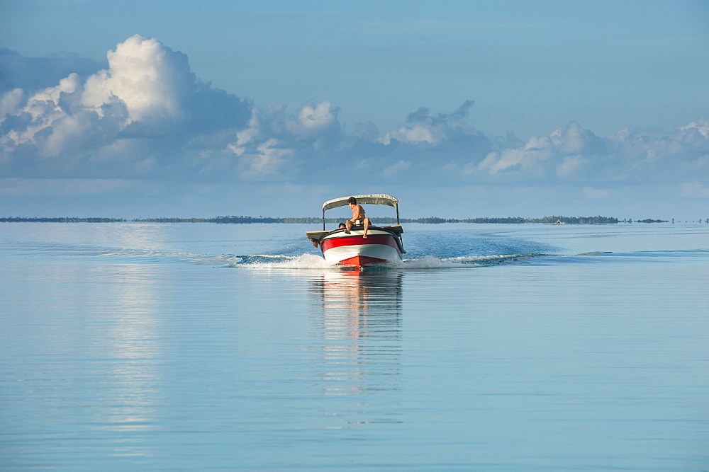 Boat in the waters of Tikehau, Tuamotus, French Polynesia, Oceania