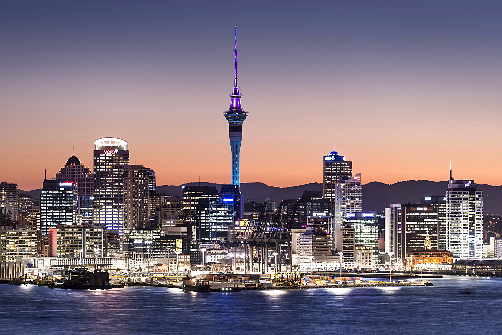 Skyline of Auckland with the Sky Tower at dusk, Auckland, North Island, New Zealand, Oceania