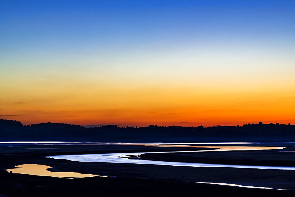 Sunrise with Lech river in foreground, Forggensee, Fussen, Ostallgau, Bavaria, Germany, Europe