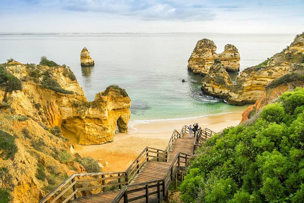 Camilo Beach with wooden walkway to the sandy beach, Lagos, Algarve, Portugal, Europe