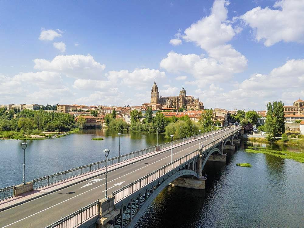 Cityscape of Salamanca with bridge over Tormes river and cathedral, Spain, Europe