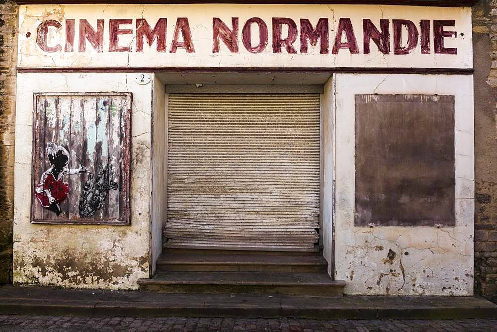 Expired entrance of a closed cinema in Bayeux, Normandy, France, Europe