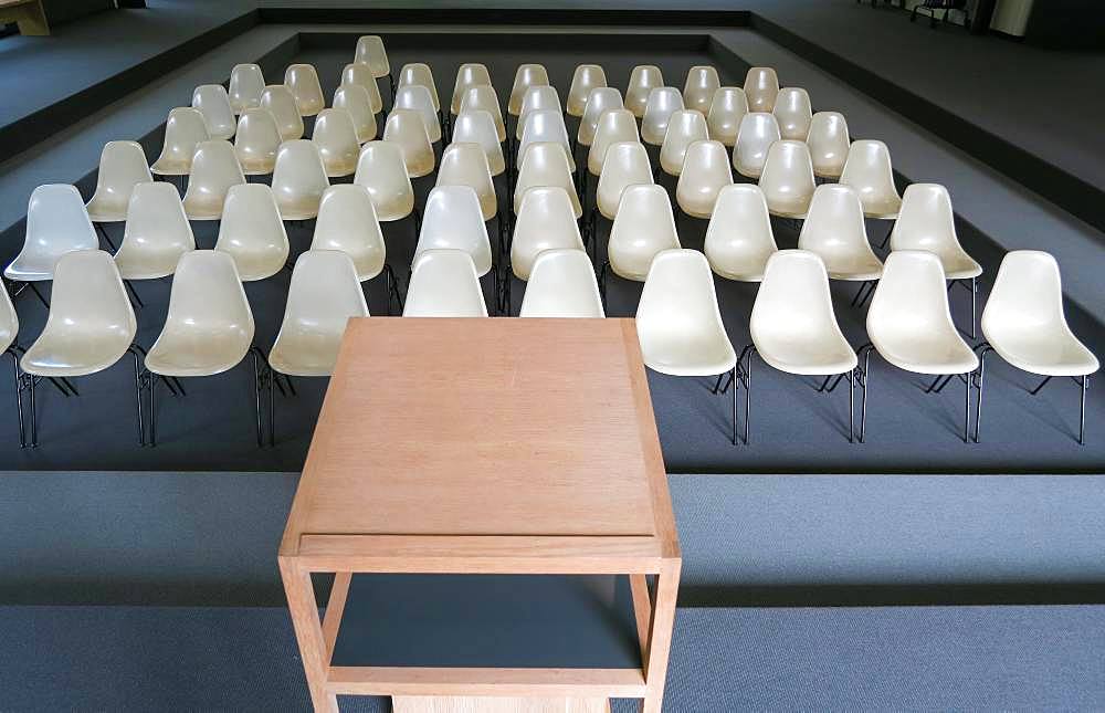 Empty chairs with desk in an auditorium, Germany, Europe