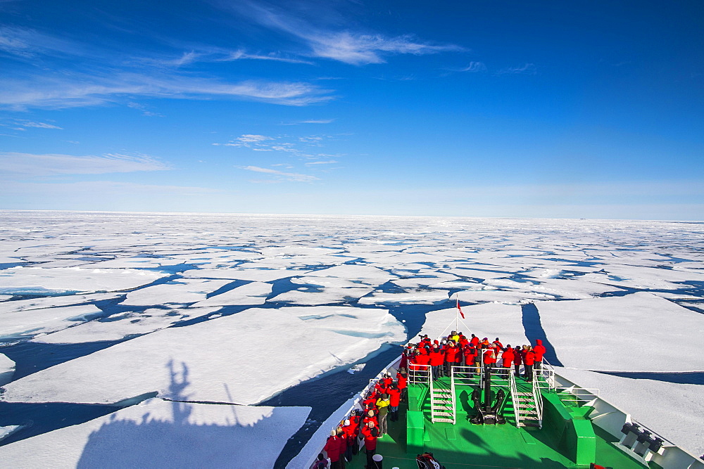 Expedition ship navigating through the pack ice in the Arctic, Svalbard, Norway, Europe