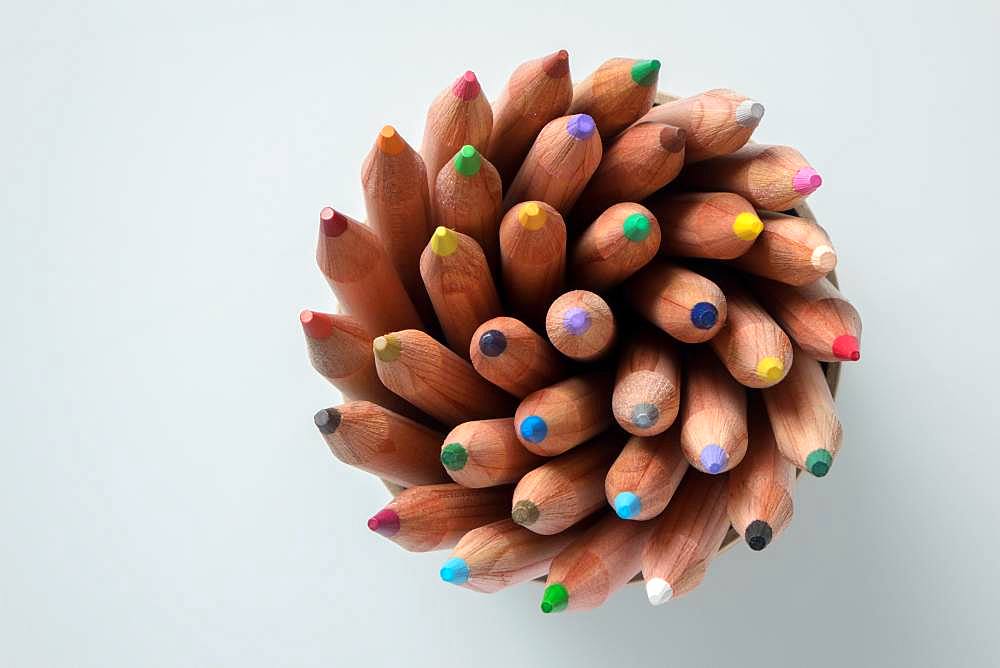 Coloured coloured pencils arranged in a circle, Germany, Europe