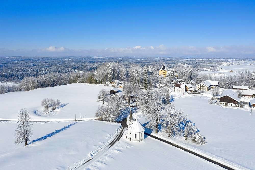 Harmarting with Castle Harmating and Chapel St. Leonhard in Winter, drone shot, Egling, Upper Bavaria, Bavaria, Germany, Europe