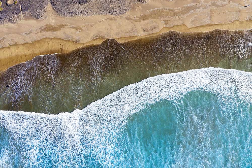 Waves running out at sandy beach, Playa Famara near Caleta de Famara, drone shot, Lanzarote, Canary Islands, Spain, Europe