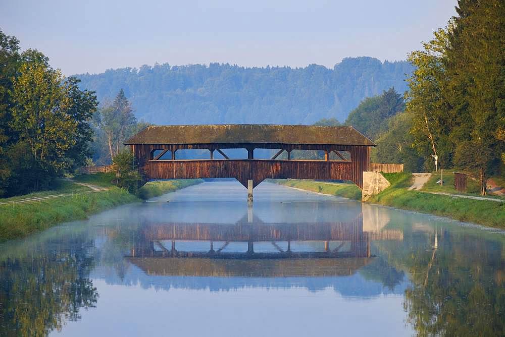 Wooden bridge over Isar channel, Aumuehle, Nature Reserve Isarauen near Egling, Upper Bavaria, Bavaria, Germany, Europe