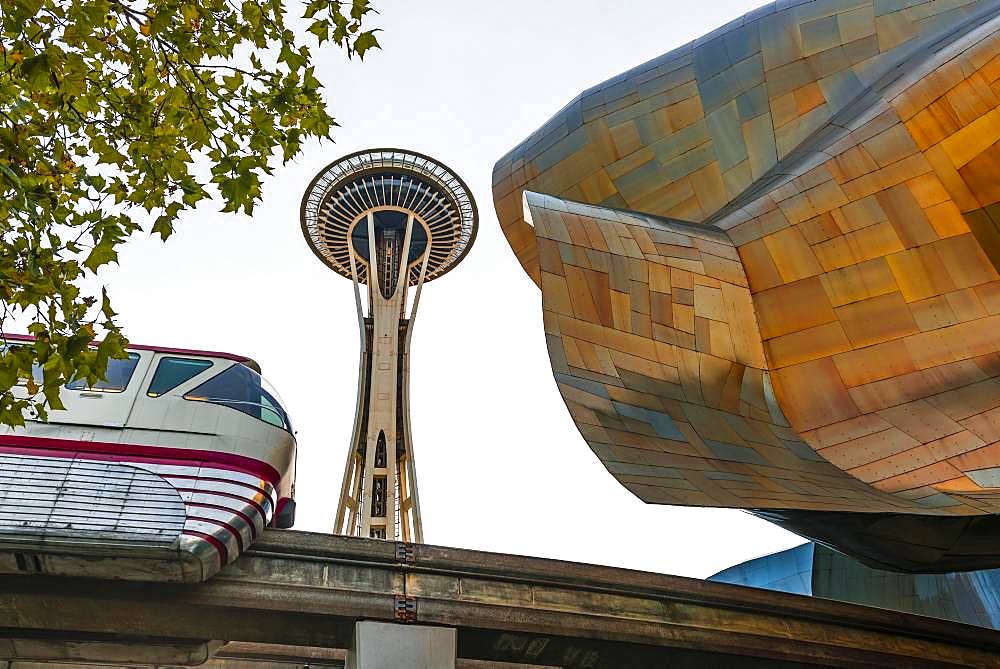 Monorail train runs through the Museum of Pop Culture, MoPOP, architect Frank Gehry, Space Needle, Seattle, Washington, USA, North America