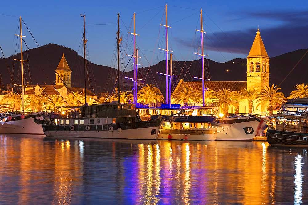 Port with sailing ships at dusk, Old Town, Trogir, Dalmatia, Croatia, Europe