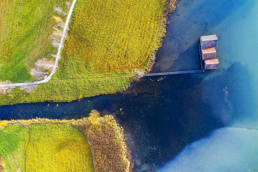 Bay with boathouses at the Lake Kochel, near Schlehdorf, drone shot, The Blue Land, Alpine foothills, Upper Bavaria, Bavaria, Germany, Europe