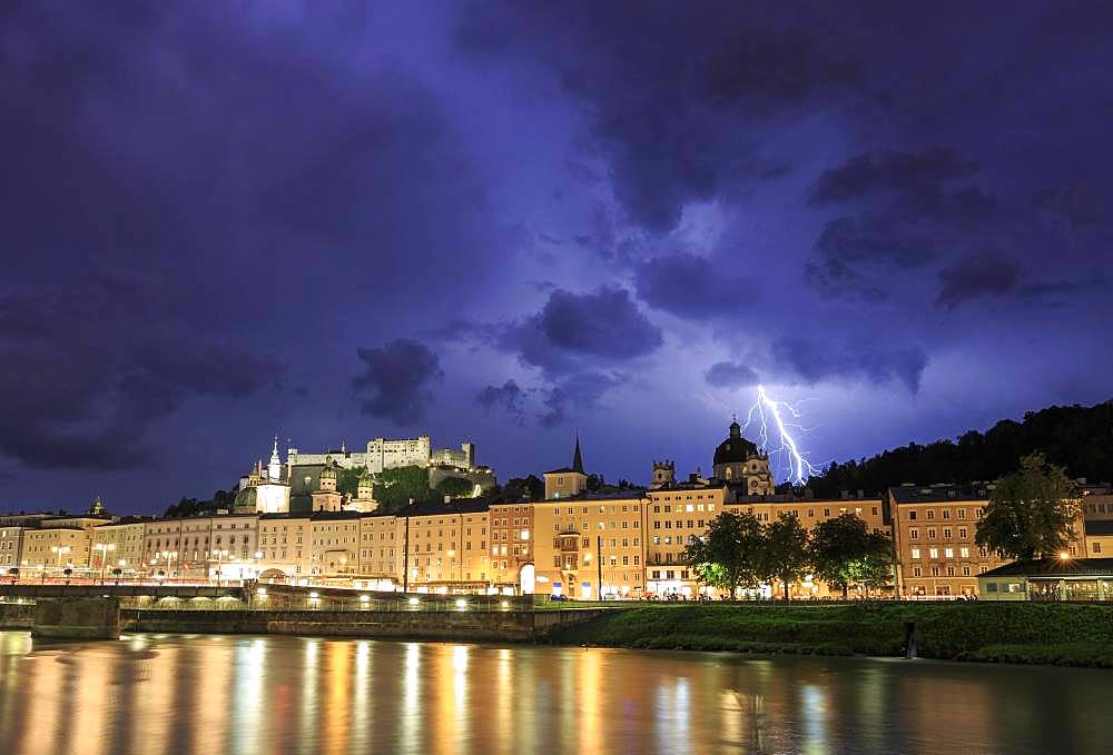 City view, old town and fortress Hohensalzburg with lightning during thunderstorms, Salzburg, Salzburg State, Austria, Europe