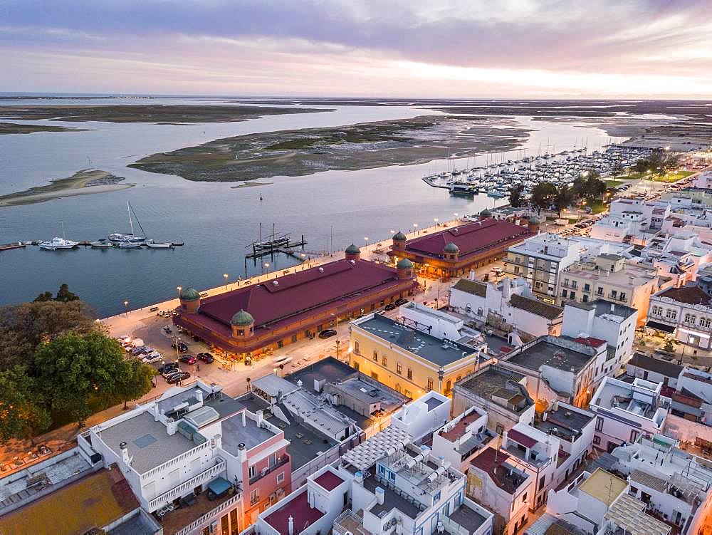 City view with two market buildings and and river Ria Formosa in the evening, Ria Formosa Natural Park, Olhao, Algarve, Portugal, Europe