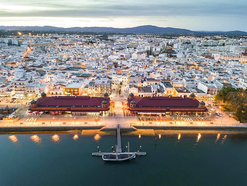 City view with two market buildings in the evening, river Ria Formosa, Olhao, Algarve, Portugal, Europe