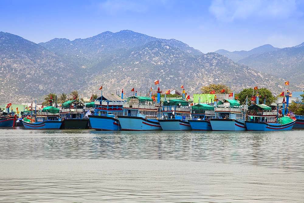 Vietnamese fishing boats in port near Cana, South China Sea, Vietnam, Asia