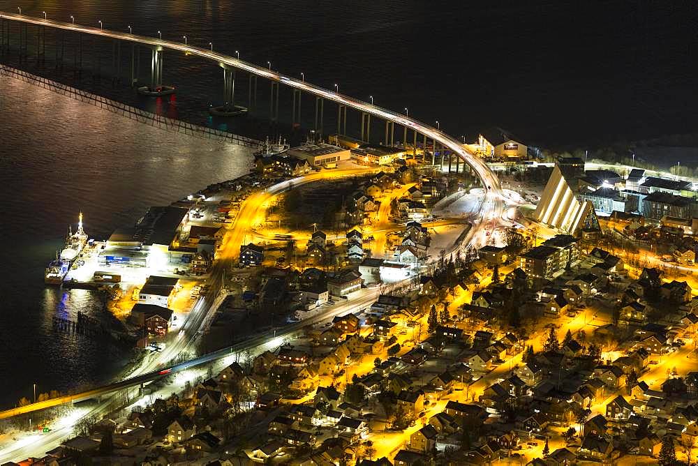 View from Fjellheisen to the Arctic Cathedral and the car bridge at night, Tromsoe, Norway, Europe