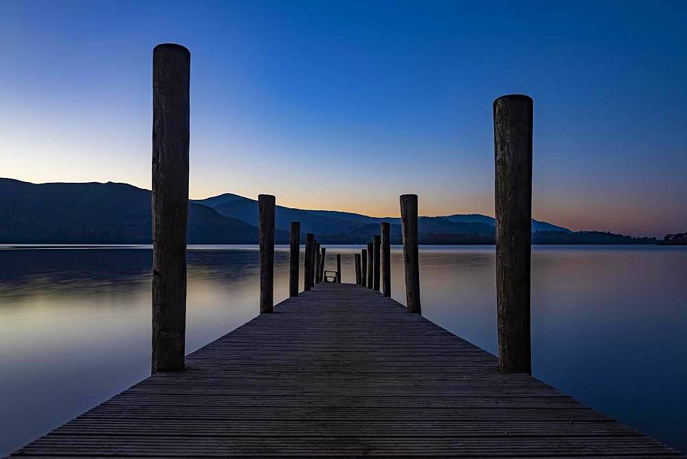 Lake Derwentwater with jetty at sunset, Keswick, Yorkshire Dales National Park, Central England, Great Britain