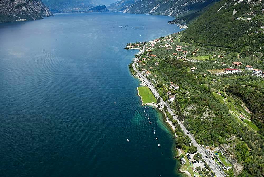 Lake Garda east shore with paragliding area near Malcesine, aerial view, Province of Veneto, Italy, Europe