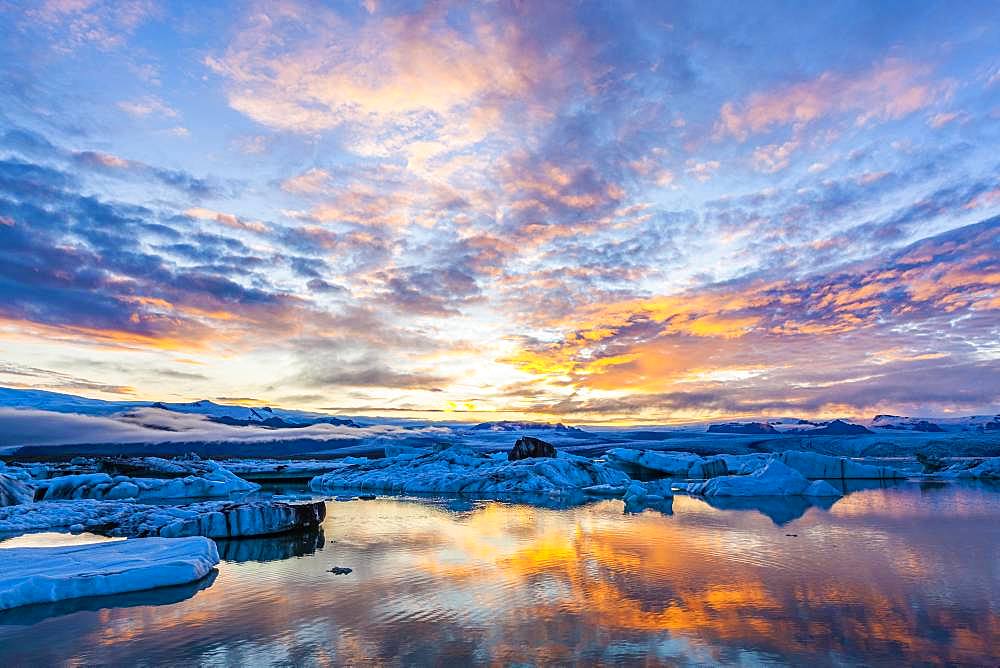 Icebergs in the glacier lagoon Joekulsarlon at sunset, South Iceland, Iceland, Europe