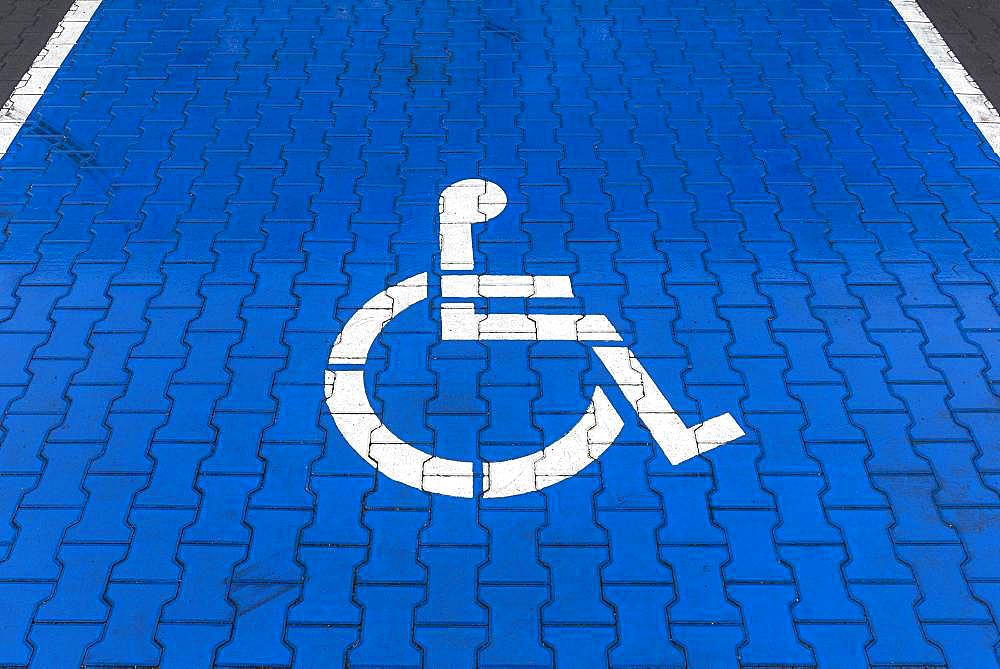 Blue marked parking for disabled, Krakow, Poland, Europe