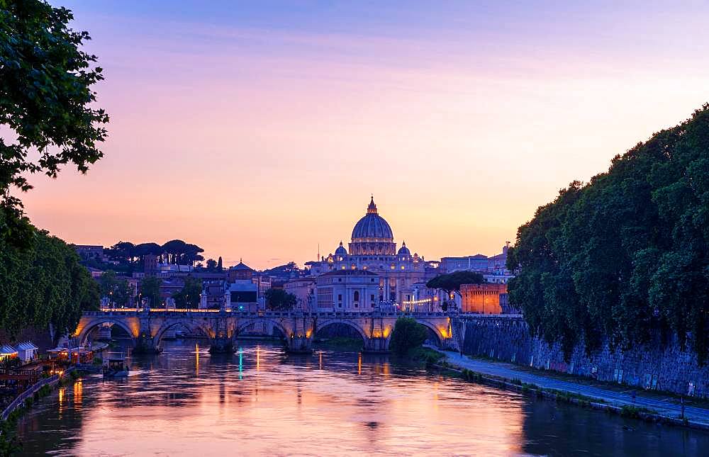 Saint Peter's Basilica with Sant' Angelo's Bridge over Tiber at sunset, Rome, Italy, Europe