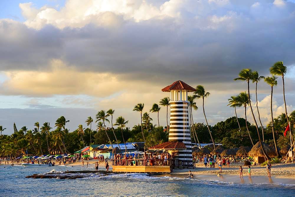 Lighthouse in the evening light, bar of Hotel Iberostar Hacienda Dominicus, beach Dominicus, Bayahibe, Dominican Republic, Central America