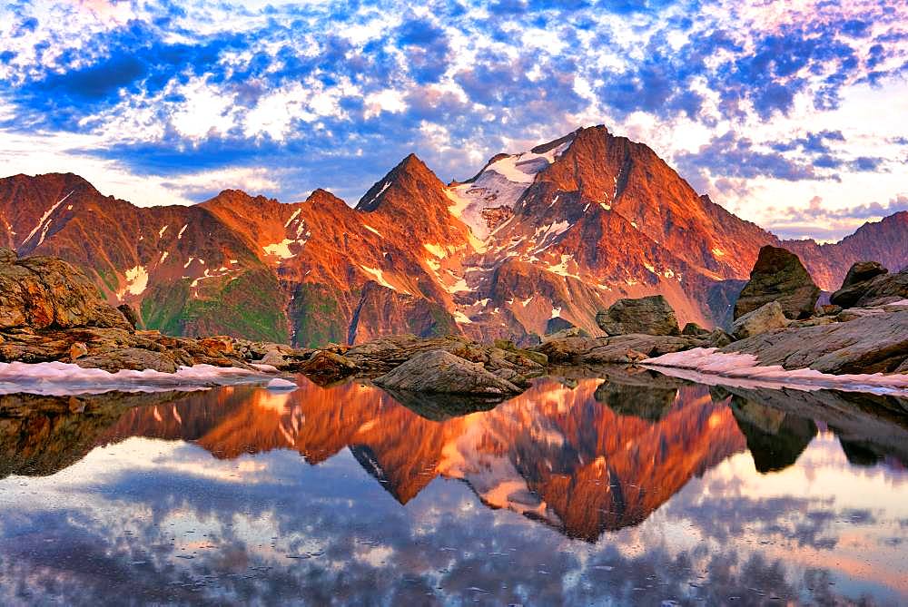 Reflection of the Oberalpstock in a mountain lake, Maderanertal, Canton Uri, Switzerland, Europe