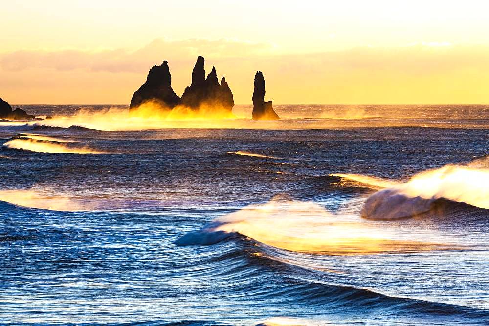 Reynisdrangar, stormy sea at sunrise, near Reynisfjara, Sudurland, South Iceland, Iceland, Europe