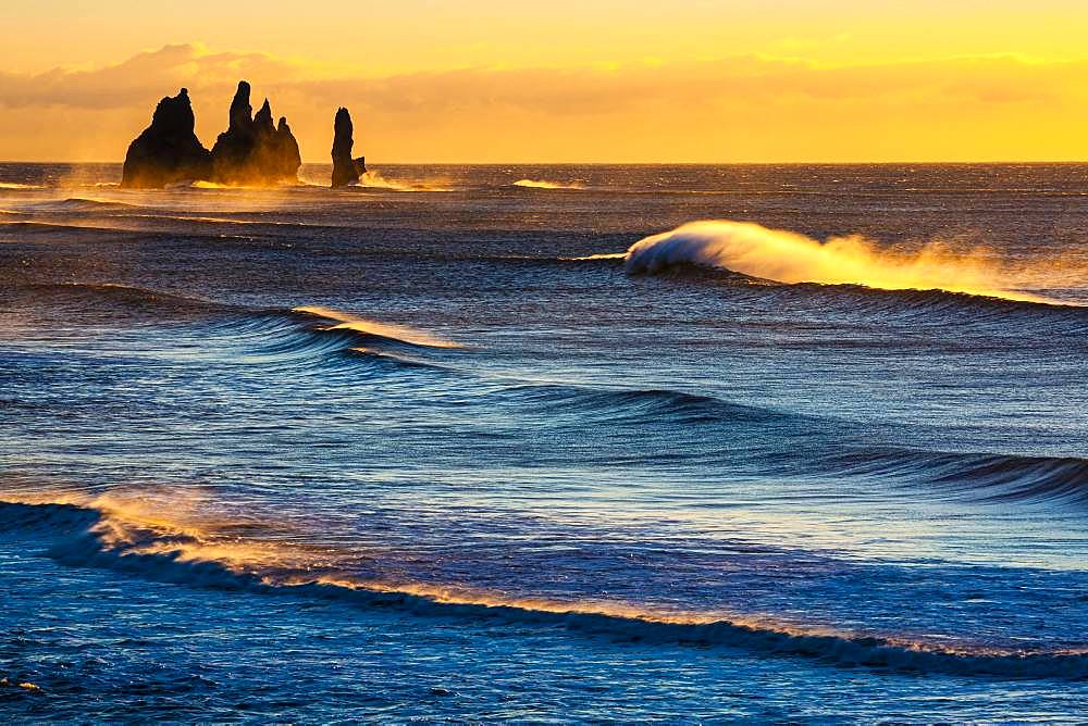 Reynisdrangar, stormy sea at sunrise, near Reynisfjara, Sudurland, South Iceland, Iceland, Europe