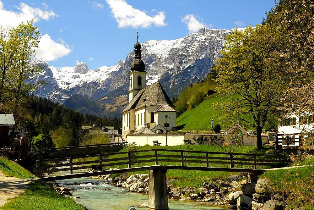 Parish church St. Sebastian in spring with Ramsauer Ache, Reiteralpe at the back, Ramsau, Berchtesgaden, Berchtesgadener Land, Upper Bavaria, Bavaria, Germany, Europe