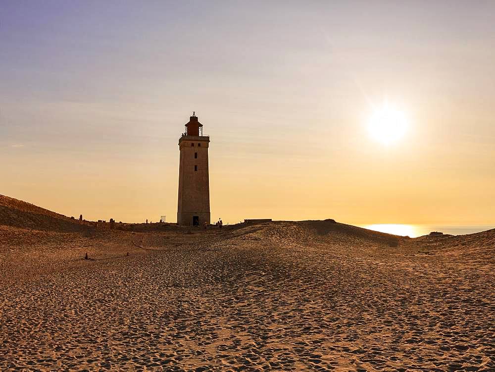 Lighthouse on the moving dune Rubjerg Knude at sunset, Lokken, Lokken, Nordjylland, Nordjutland, Denmark, Europe