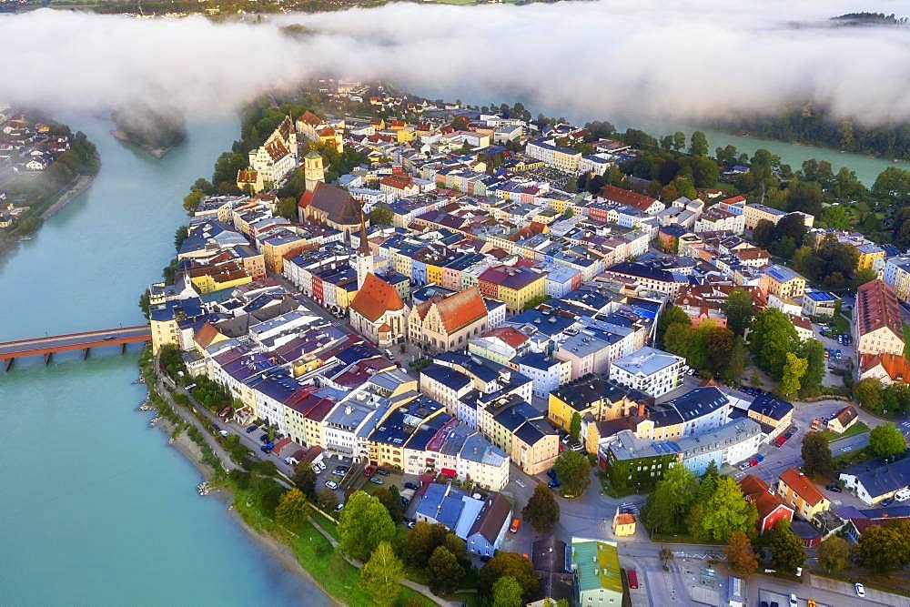 Old town in river loop of the Inn at sunrise, moated castle am Inn, aerial view, Upper Bavaria, Bavaria, Germany, Europe