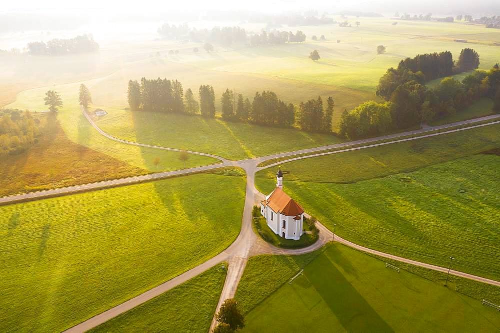 Aerial view, Church St. Leonhard, Leonhardikirche, in the morning light, Dietramszell, Toelzer Land, Upper Bavaria, Bavaria, Germany, Europe