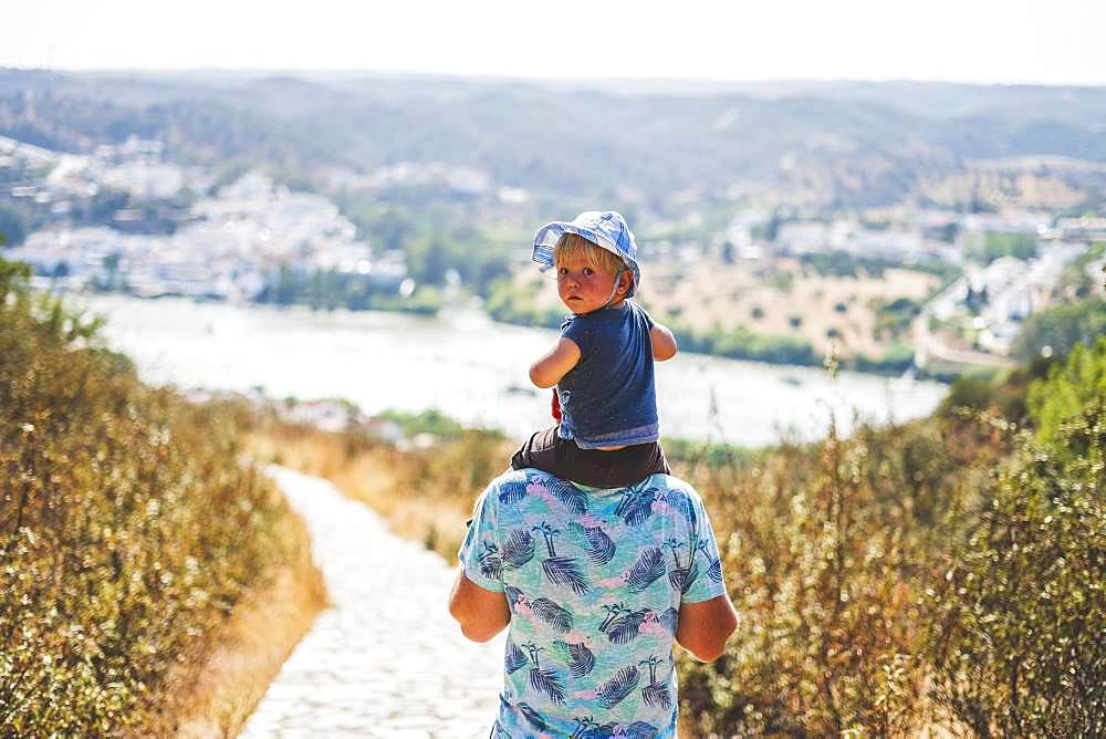 Father walking with his son, Spain, Europe