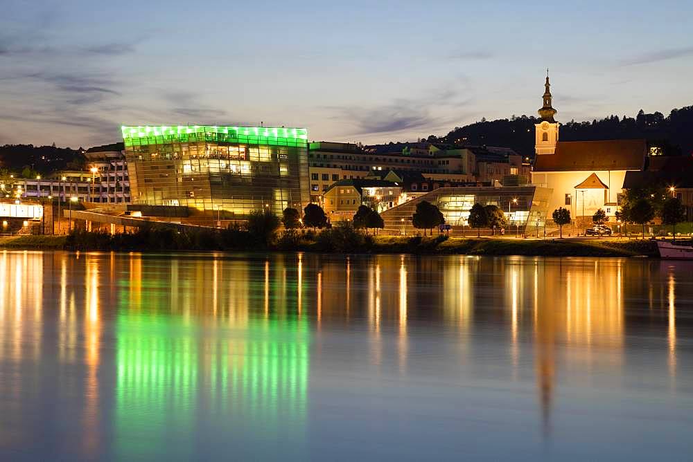 Danube bank with Ars Electronica Center at dusk, Linz, Upper Austria, Austria, Europe