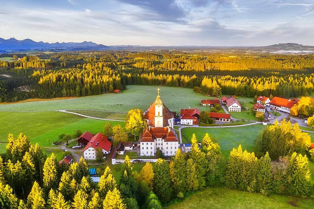 Wieskirche in the morning light, pilgrimage church to the Scourged Saviour on the Wies, Wies, near Steingaden, Pfaffenwinkel, aerial view, Upper Bavaria, Bavaria, Germany, Europe