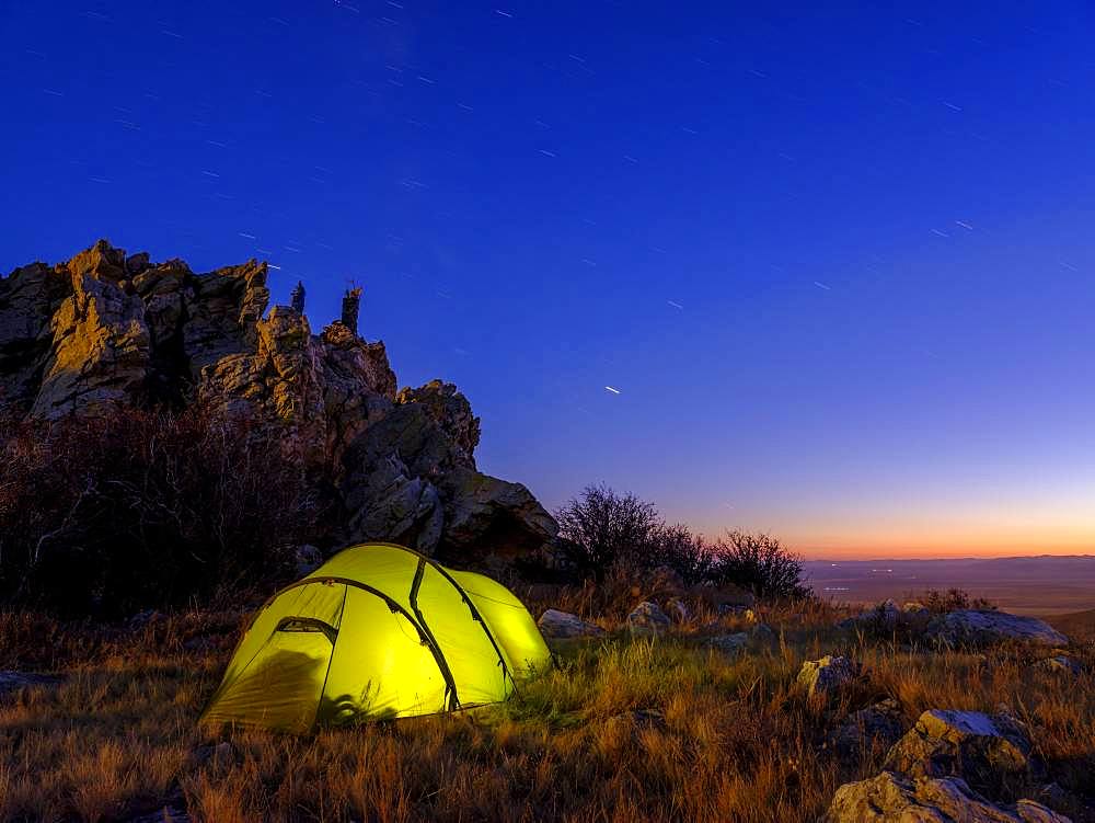 Tent under a rock at dusk, Toew Aimag, Toew province, Mongolia, Asia