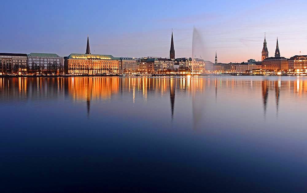 Inner Alster Lake with Alster fountain at dusk, Hamburg, Germany, Europe