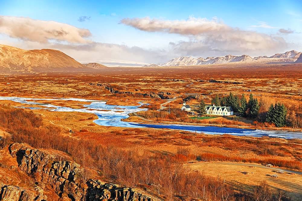 Pingvellir, Thingvellir National Park, church and five-gable house by the river, sunny autumn day, Golden Circle, Iceland, Europe